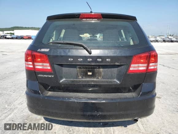 2013 Dodge Journey American Value z VIN 3C4PDCAB7DT701258, wystawiony jako Copart lot #58729024 z przebiegiem 107 366 mil mil oraz Szkoda całkowita • Salvage title. Historia ofert i sprzedaży dostępna na DreamBid. Obrazek 6.