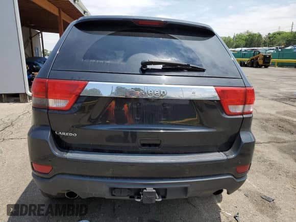 2012 Jeep Grand Cherokee Laredo с VIN 1C4RJEAT6CC301188, выставлен на аукционе Copart как лот 59602325 с пробегом 163 126 миль миль и Списание • Salvage title. История ставок и продаж доступна на DreamBid. Изображение 6.