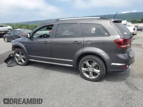 2017 Dodge Journey Crossroad Plus with VIN 3C4PDDGG1HT555938, listed as a Copart auction lot 68669955 with 95,858 mi miles and Salvage title. Bid and sale history available at DreamBid. Image 2.