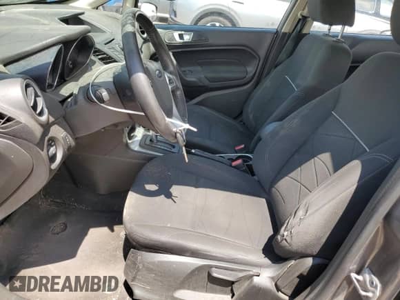 2014 Ford Fiesta SE с VIN 3FADP4BJ4EM190311, выставлен на аукционе Copart как лот 68228075 с пробегом 71 212 миль миль и Списание • Salvage title. История ставок и продаж доступна на DreamBid. Изображение 7.
