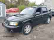 2004 Subaru Forester XT with VIN JF1SG69654G711341, listed as a IAAI auction lot 43436648 with 143,893 mi miles and . Bid and sale history available at DreamBid. Image 2.