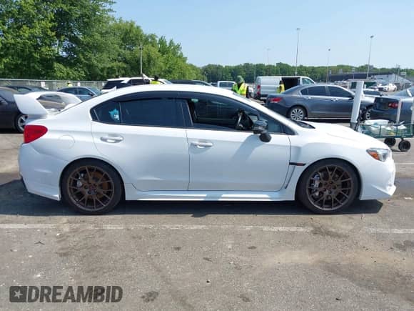2020 Subaru WRX STI with VIN JF1VA2S62L9812924, listed as a IAAI auction lot 42808812 with 39,216 mi miles and . Bid and sale history available at DreamBid. Image 13.