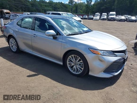 2019 Toyota Camry SE z VIN 4T1B11HK7KU778045, wystawiony jako IAAI lot #43079893 z przebiegiem 58 799 mil mil oraz . Historia ofert i sprzedaży dostępna na DreamBid. Obrazek 1.