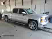 2015 Chevrolet Silverado 1500 LT with VIN 1GCUKREC3FF198520, listed as a Copart auction lot 59369405 with 154,502 mi miles and Salvage title. Bid and sale history available at DreamBid. Image 4.