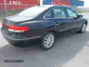 2009 Hyundai Azera GLS with VIN KMHFC46D79A349906, listed as a IAAI auction lot 41999587 with 98,714 mi miles and . Bid and sale history available at DreamBid. Image 4.