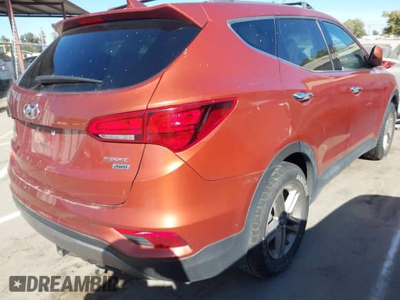 2017 Hyundai Santa Fe 2.4L z VIN 5XYZTDLB1HG443833, wystawiony jako IAAI lot #42908168 z przebiegiem 137 312 mil mil oraz . Historia ofert i sprzedaży dostępna na DreamBid. Obrazek 6.
