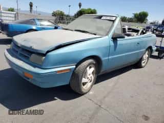1993 Dodge Shadow with VIN 3B3XP45K6PT583605, listed as a Copart auction lot 61041005 with 166,515 mi miles and Clean title. Bid and sale history available at DreamBid. Image 1.