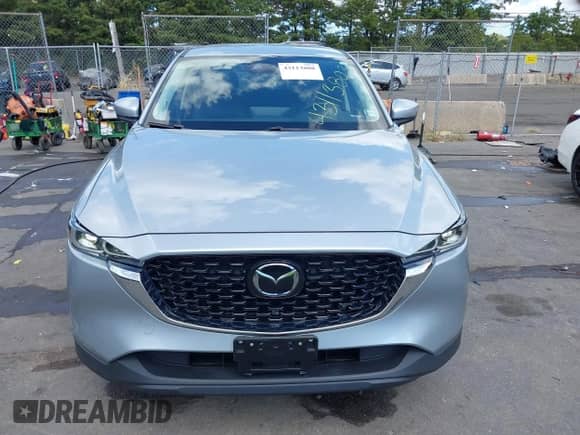 2023 Mazda CX-5 S Select with VIN JM3KFBBM6P0208887, listed as a IAAI auction lot 43113803 with 26,288 mi miles and . Bid and sale history available at DreamBid. Image 12.