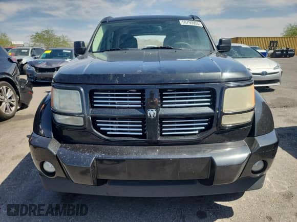 2011 Dodge Nitro Heat with VIN 1D4PT4GX6BW506192, listed as a Copart auction lot 58795955 with 231,377 mi miles and Salvage title. Bid and sale history available at DreamBid. Image 5.