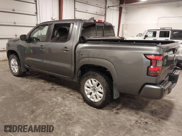 2022 Nissan Frontier SV z VIN 1N6ED1EK6NN674574, wystawiony jako IAAI lot #43176314 z przebiegiem 56 261 mil mil oraz . Historia ofert i sprzedaży dostępna na DreamBid. Obrazek 3.