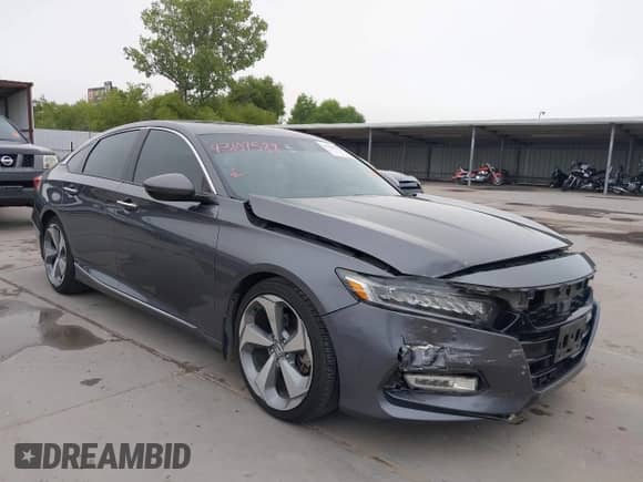2018 Honda Accord Touring z VIN 1HGCV1F95JA100229, wystawiony jako IAAI lot #43109588 z przebiegiem 129 307 mil mil oraz . Historia ofert i sprzedaży dostępna na DreamBid. Obrazek 1.