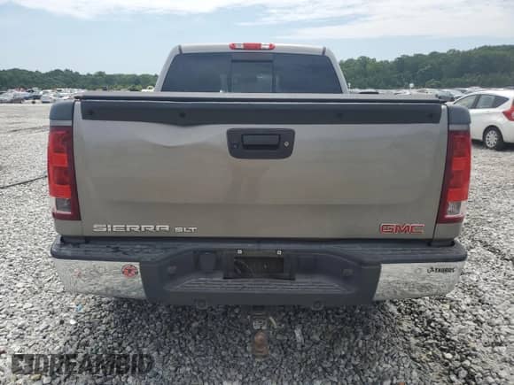 2013 GMC Sierra 1500 SLT с VIN 3GTP2WE70DG208138, выставлен на аукционе Copart как лот 62577275 с пробегом 132 588 миль миль и Списание • Salvage title. История ставок и продаж доступна на DreamBid. Изображение 6.