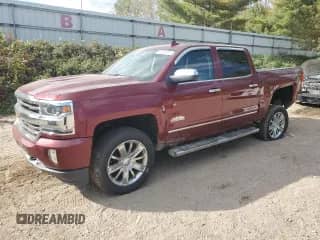 2016 Chevrolet Silverado 1500 High Country z VIN 3GCUKTEC4GG366209, wystawiony jako Copart lot #84909315 z przebiegiem 129 785 mil mil oraz Czysty tytuł • Clean title. Historia ofert i sprzedaży dostępna na DreamBid. Obrazek 1.