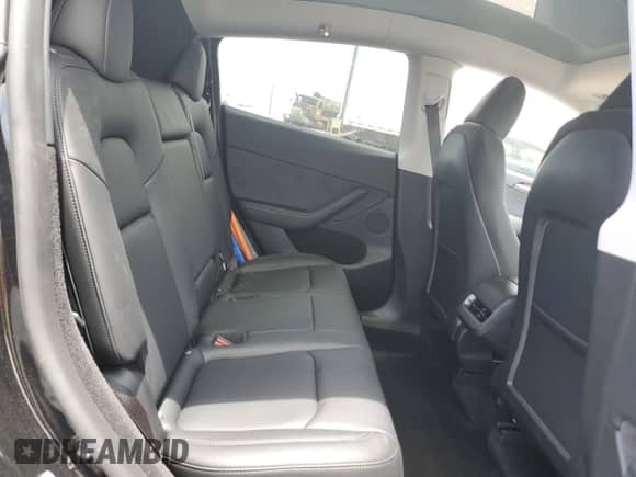 2023 Tesla Model Y Performance z VIN 7SAYGDEF0PF958265, wystawiony jako Copart lot #65881755 z przebiegiem 9 581 mil mil oraz Szkoda całkowita • Salvage title. Historia ofert i sprzedaży dostępna na DreamBid. Obrazek 10.