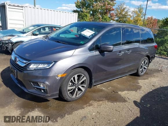 2018 Honda Odyssey Elite z VIN 5FNRL6H91JB071957, wystawiony jako IAAI lot #43506915 z przebiegiem 75 656 mil mil oraz . Historia ofert i sprzedaży dostępna na DreamBid. Obrazek 18.