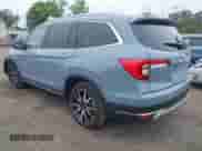 2022 Honda Pilot Touring 7-Passenger z VIN 5FNYF6H68NB056077, wystawiony jako IAAI lot #42357338 z przebiegiem 18 193 mil mil oraz . Historia ofert i sprzedaży dostępna na DreamBid. Obrazek 3.