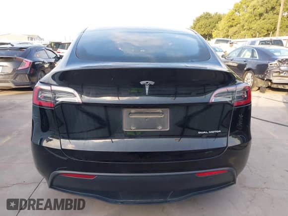 2023 Tesla Model Y Long Range z VIN 7SAYGAEE7PF767951, wystawiony jako IAAI lot #43128878 z przebiegiem 36 431 mil mil oraz . Historia ofert i sprzedaży dostępna na DreamBid. Obrazek 16.