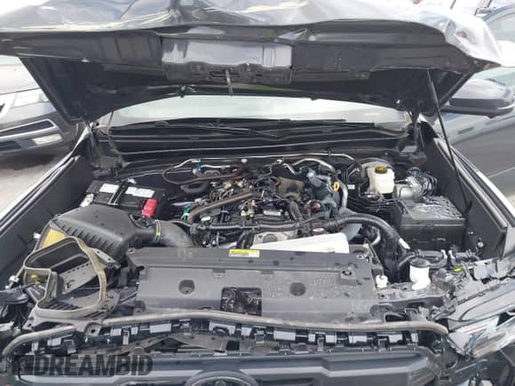 2024 Toyota Tacoma SR5 z VIN 3TMLB5JN2RM051282, wystawiony jako IAAI lot #42370502 z przebiegiem 3 932 mil mil oraz . Historia ofert i sprzedaży dostępna na DreamBid. Obrazek 10.