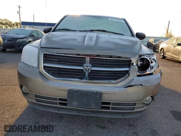 2007 Dodge Caliber R/T with VIN 1B3HB78K07D282866, listed as a Copart auction lot 82723575 with 113,797 mi miles and Salvage title. Bid and sale history available at DreamBid. Image 5.