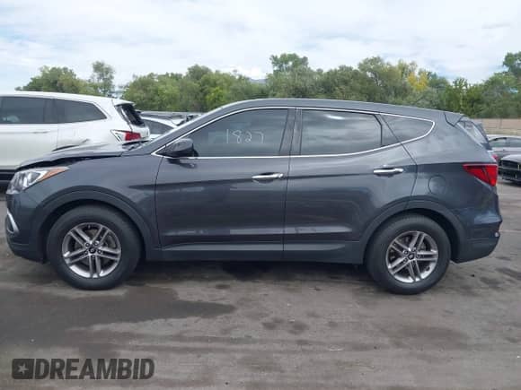 2018 Hyundai Santa Fe 2.4L with VIN 5XYZT3LB7JG562034, listed as a IAAI auction lot 43175229 with 93,961 mi miles and . Bid and sale history available at DreamBid. Image 14.