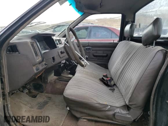 1991 Nissan Frontier z VIN 1N6SD11S9MC419923, wystawiony jako Copart lot #85189314 z przebiegiem 245 003 mil mil oraz Szkoda całkowita • Salvage title. Historia ofert i sprzedaży dostępna na DreamBid. Obrazek 7.