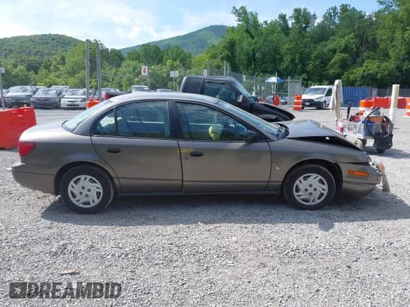 2001 Saturn SL with VIN 1G8ZF52851Z238231, listed as a IAAI auction lot 42454503 with 144,748 mi miles and . Bid and sale history available at DreamBid. Image 14.