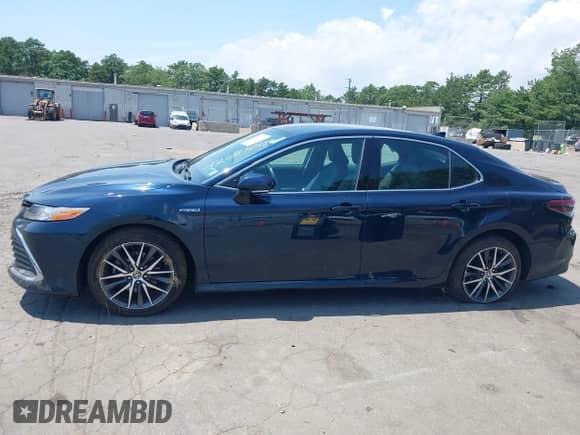2021 Toyota Camry Hybrid XLE with VIN 4T1F31AK3MU554067, listed as a IAAI auction lot 42681018 with 53,630 mi miles and . Bid and sale history available at DreamBid. Image 14.