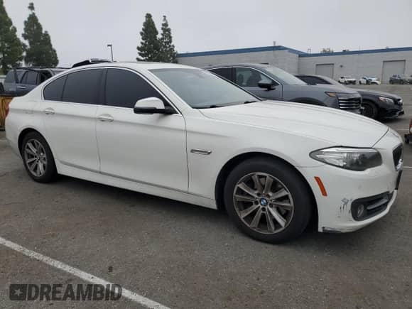 2015 BMW 5 Series 528i with VIN WBA5A5C59FD516234, listed as a Copart auction lot 90036555 with 169,609 mi miles and Clean title. Bid and sale history available at DreamBid. Image 4.