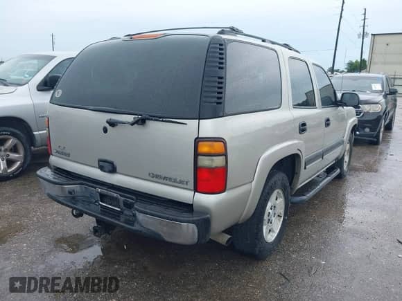 2004 Chevrolet Tahoe LT with VIN 1GNEC13Z04R203993, listed as a IAAI auction lot 42468158 with 233,657 mi miles and . Bid and sale history available at DreamBid. Image 4.