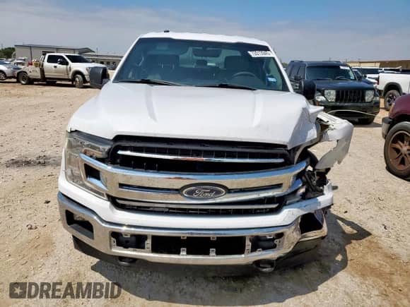 2018 Ford F-150 XL с VIN 1FTEW1E50JKE01925, выставлен на аукционе Copart как лот 72013945 с пробегом 162 110 миль миль и Списание • Salvage title. История ставок и продаж доступна на DreamBid. Изображение 5.
