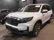 2022 Honda Passport EX-L with VIN 5FNYF8H52NB001840, listed as a IAAI auction lot 41598646 with 53,734 mi miles and . Bid and sale history available at DreamBid. Image 2.