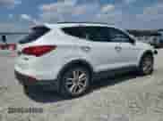 2016 Hyundai Santa Fe с VIN 5XYZW4LAXGG350127, выставлен на аукционе Copart как лот 61919305 с пробегом 167 889 миль миль и Списание • Salvage title. История ставок и продаж доступна на DreamBid. Изображение 3.