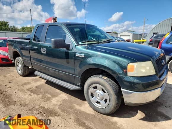 2005 Ford F-150 XLT with VIN 1FTPX14515NA03344, listed as a Copart auction lot 81421415 with 213,914 mi miles and Salvage title. Bid and sale history available at DreamBid. Image 4.