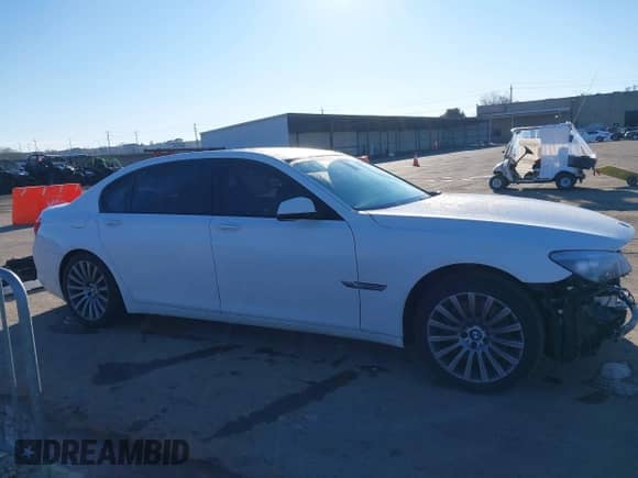 2012 BMW 7 Series 750Li с VIN WBAKB8C58CC964225, выставлен на аукционе IAAI как лот 41228368 с пробегом 94 583 миль миль и . История ставок и продаж доступна на DreamBid. Изображение 14.
