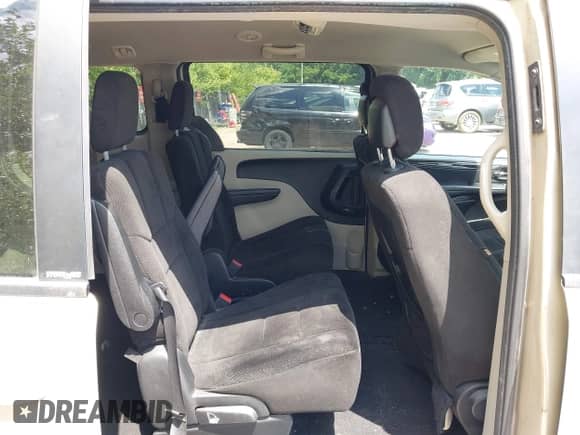 2012 Dodge Grand Caravan SE z VIN 2C4RDGBG4CR389301, wystawiony jako IAAI lot #42615267 z przebiegiem 164 286 mil mil oraz . Historia ofert i sprzedaży dostępna na DreamBid. Obrazek 8.