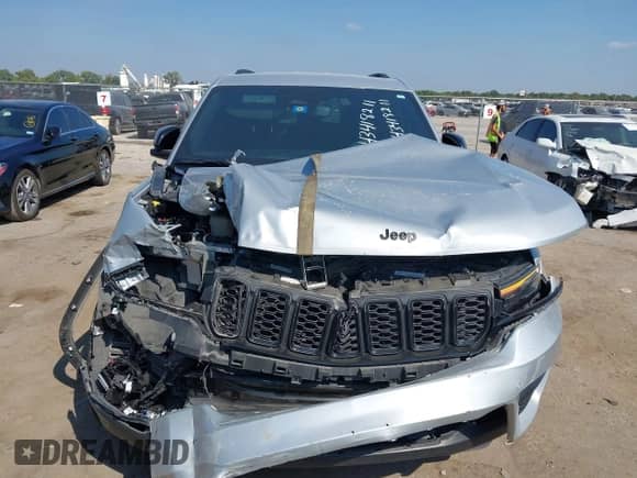 2023 Jeep Grand Cherokee Laredo with VIN 1C4RJHAG5PC659828, listed as a IAAI auction lot 43418211 with 27,942 mi miles and . Bid and sale history available at DreamBid. Image 11.