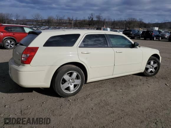 2005 Dodge Magnum SXT с VIN 2D4GZ48VX5H644848, выставлен на аукционе Copart как лот 87614515 с пробегом 146 577 миль миль и На запчасти • Non repairable. История ставок и продаж доступна на DreamBid. Изображение 3.
