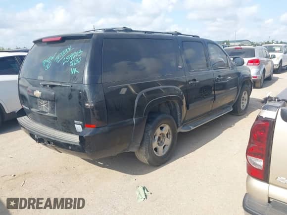 2011 Chevrolet Suburban LT with VIN 1GNSCJE07BR259203, listed as a IAAI auction lot 42888910 with 246,717 mi miles and . Bid and sale history available at DreamBid. Image 4.