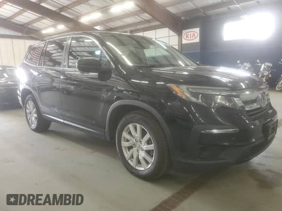 2019 Honda Pilot LX с VIN 5FNYF6H17KB051565, выставлен на аукционе Copart как лот 60933025 с пробегом 273 070 миль миль и Чистый • Clean title. История ставок и продаж доступна на DreamBid. Изображение 4.