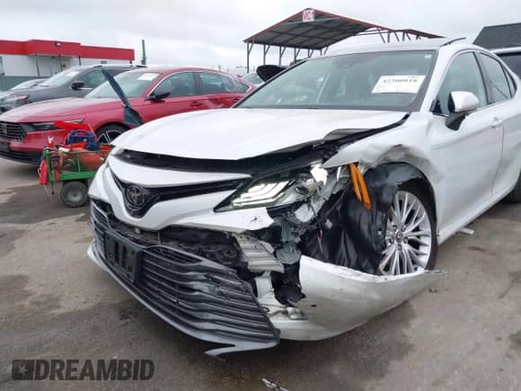 2019 Toyota Camry SE z VIN 4T1B11HK5KU720581, wystawiony jako IAAI lot #42300818 z przebiegiem 136 779 mil mil oraz . Historia ofert i sprzedaży dostępna na DreamBid. Obrazek 6.