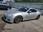 2014 Scion FR-S with VIN JF1ZNAA12E8703460, listed as a Copart auction lot 70888595 with 146,454 mi miles and Salvage title. Bid and sale history available at DreamBid. Image 1.