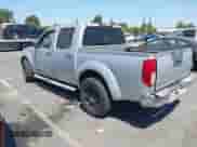 2005 Nissan Frontier SE with VIN 1N6AD07U25C424865, listed as a IAAI auction lot 42871680 with 176,479 mi miles and . Bid and sale history available at DreamBid. Image 3.