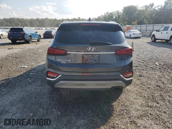 2020 Hyundai Santa Fe SEL z VIN 5NMS33AD4LH198962, wystawiony jako Copart lot #81308755 z przebiegiem 65 682 mil mil oraz Szkoda całkowita • Salvage title. Historia ofert i sprzedaży dostępna na DreamBid. Obrazek 6.