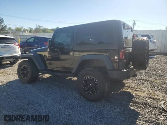 2013 Jeep Wrangler Sport with VIN 1C4AJWAG2DL660609, listed as a Copart auction lot 81088605 with 120,163 mi miles and Salvage title. Bid and sale history available at DreamBid. Image 2.