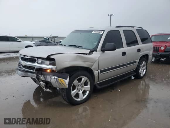 2004 Chevrolet Tahoe LS with VIN 1GNEC13Z24R310768, listed as a Copart auction lot 55886055 with 246,093 mi miles and Salvage title. Bid and sale history available at DreamBid. Image 1.