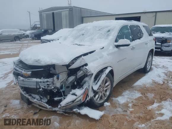 2021 Chevrolet Traverse High Country with VIN 1GNEVNKW8MJ203490, listed as a IAAI auction lot 41252324 with 70,466 mi miles and . Bid and sale history available at DreamBid. Image 2.