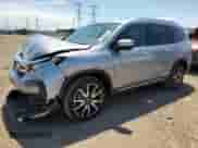 2022 Honda Pilot Touring 7-Passenger z VIN 5FNYF6H68NB052014, wystawiony jako Copart lot #61864805 z przebiegiem 39 124 mil mil oraz Szkoda całkowita • Salvage title. Historia ofert i sprzedaży dostępna na DreamBid. Obrazek 1.