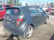 2013 Chevrolet Sonic LTZ with VIN 1G1JE6SB1D4129735, listed as a IAAI auction lot 41739740 with 116,049 mi miles and . Bid and sale history available at DreamBid. Image 4.