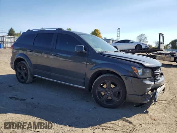 2018 Dodge Journey Crossroad with VIN 3C4PDCGGXJT339635, listed as a Copart auction lot 75655034 with 129,553 mi miles and Salvage title. Bid and sale history available at DreamBid. Image 4.