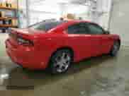 2015 Dodge Charger SXT with VIN 2C3CDXJG3FH738986, listed as a Copart auction lot 69858615 with 140,756 mi miles and Salvage title. Bid and sale history available at DreamBid. Image 3.